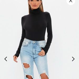 Turtle neck black body suit